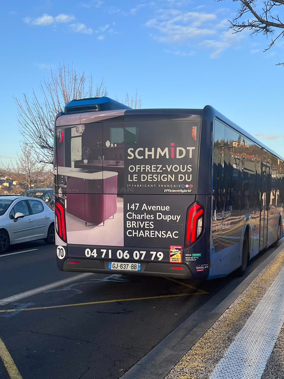 Covering arrière bus Schmitt réseau Tudip Le Puy-en-Velay publicité locale Rue Media